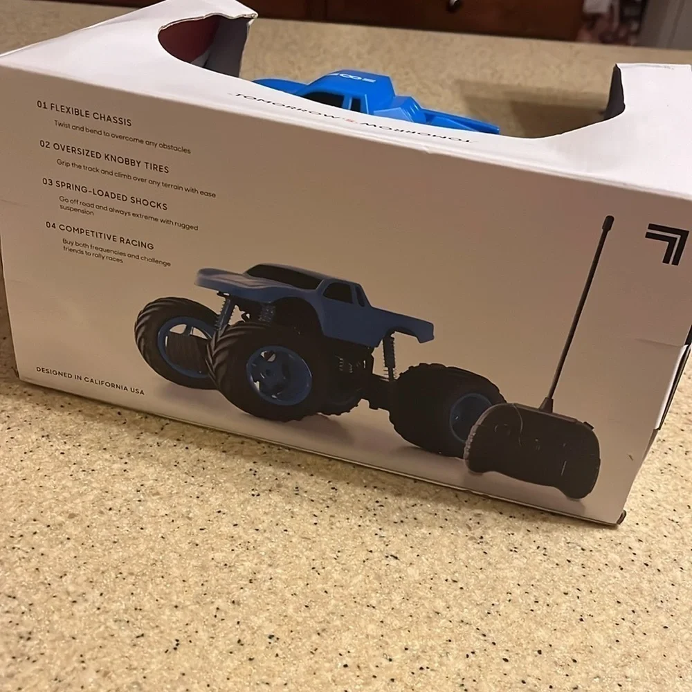 Brand New Sharper Image Remote Control Mini Monster Truck Rockslide Blue Toy